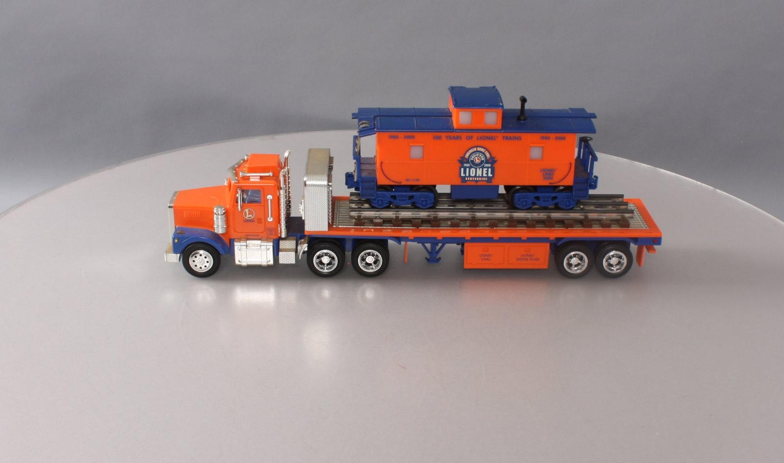Lionel TMT18405 Flatbed Toy Truck with Operating LightsSound Caboose