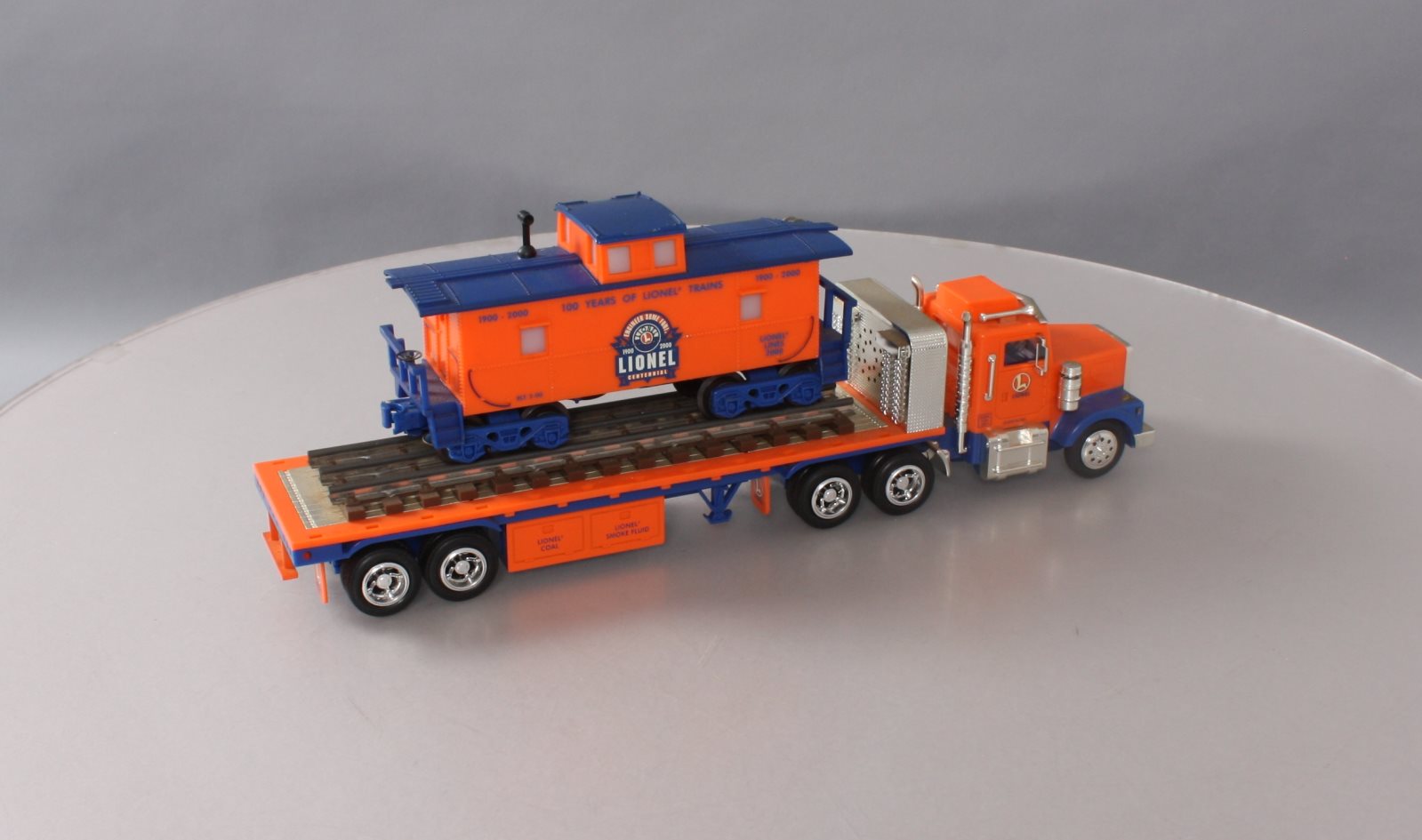 Lionel TMT18405 Flatbed Toy Truck with Operating LightsSound Caboose